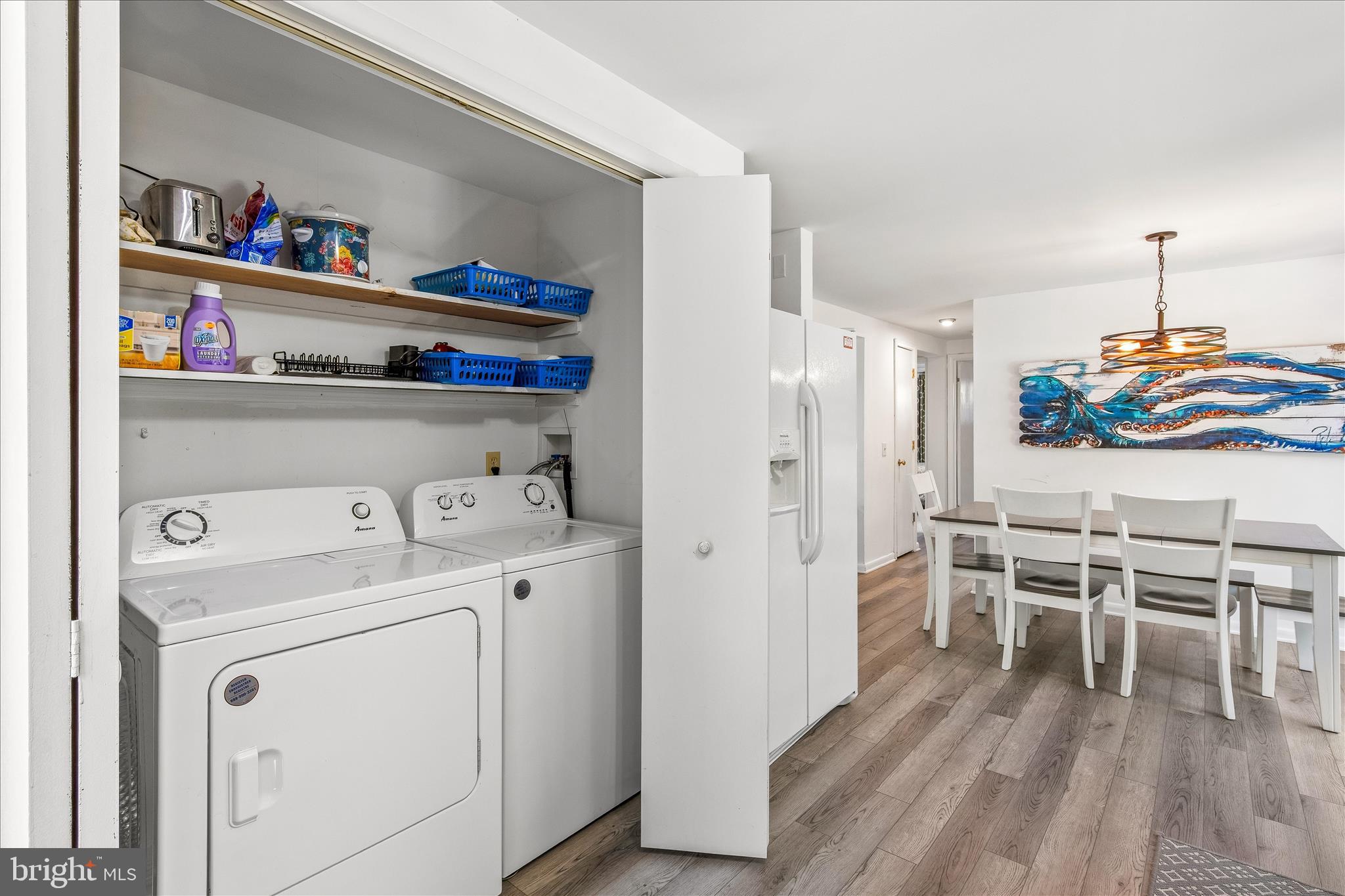 21406 Dogwood Cove Road Tilghman, MD 21671 - Photo 57 of 68 a view of washer and dryer with wooden floor