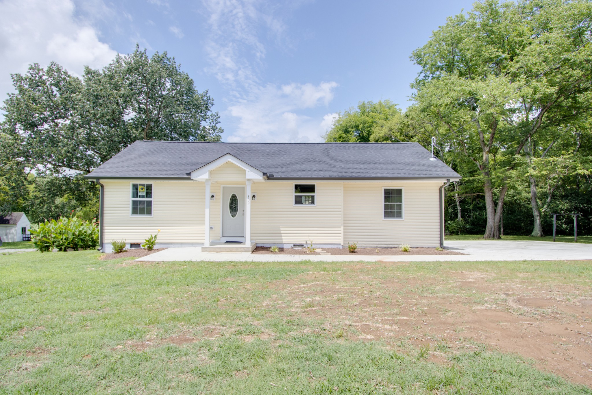 300 Randy Road Madison, TN 37115 - Photo 1 of 36 a big house with yard in front of it