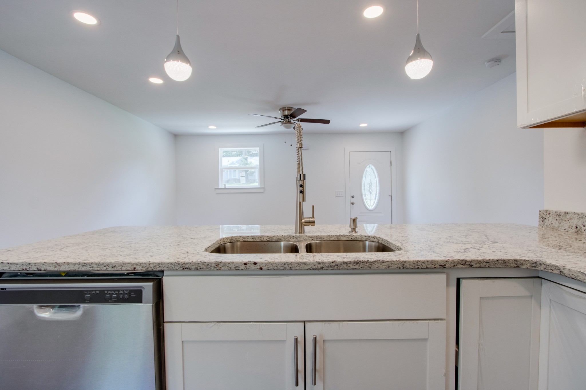 300 Randy Road Madison, TN 37115 - Photo 12 of 36 a kitchen with a sink and a mirror