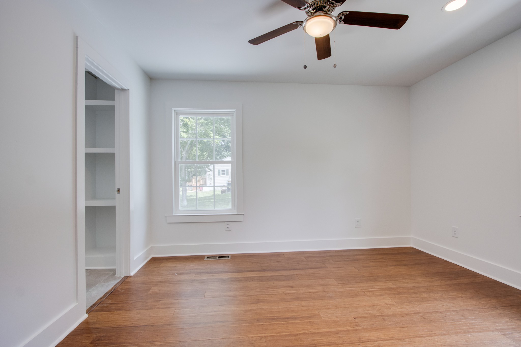 300 Randy Road Madison, TN 37115 - Photo 15 of 36 wooden floor in an empty room with a window