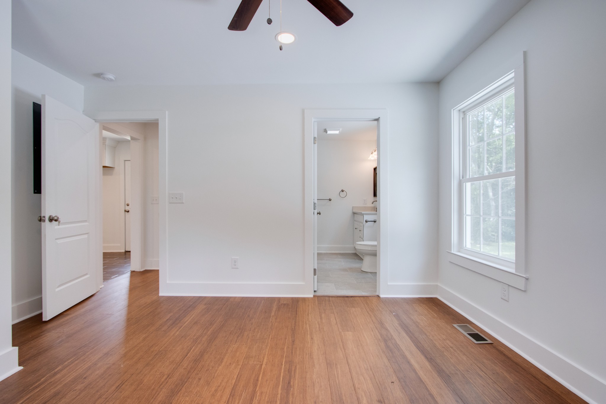300 Randy Road Madison, TN 37115 - Photo 17 of 36 wooden floor in an empty room with a window