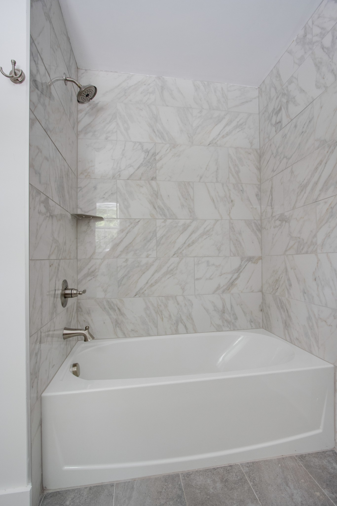 300 Randy Road Madison, TN 37115 - Photo 20 of 36 a bathroom with a bathtub and a shower
