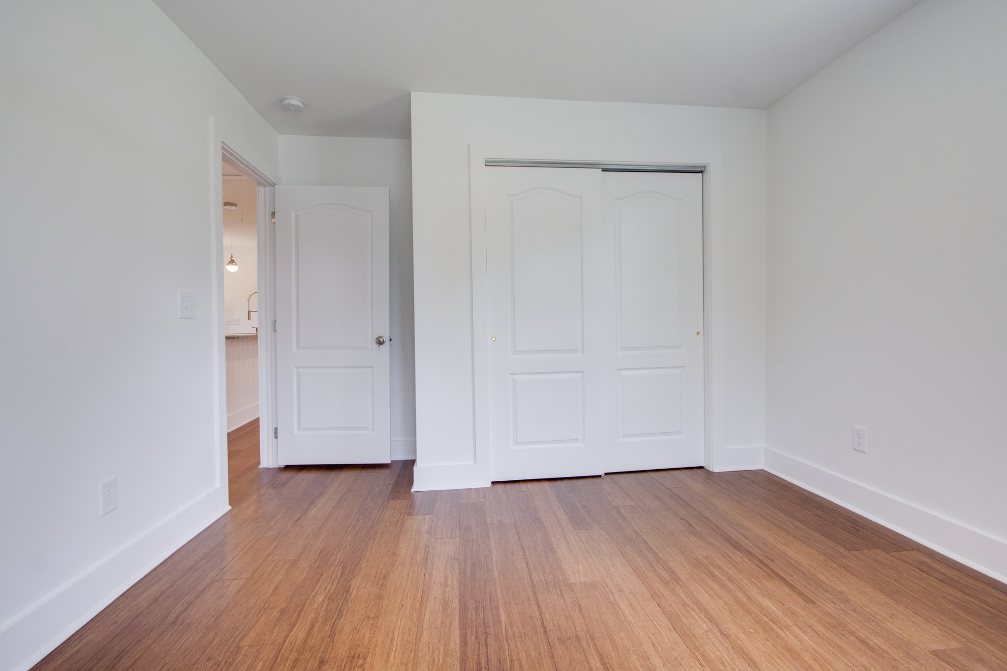 300 Randy Road Madison, TN 37115 - Photo 23 of 36 an empty room with wooden floor and closet