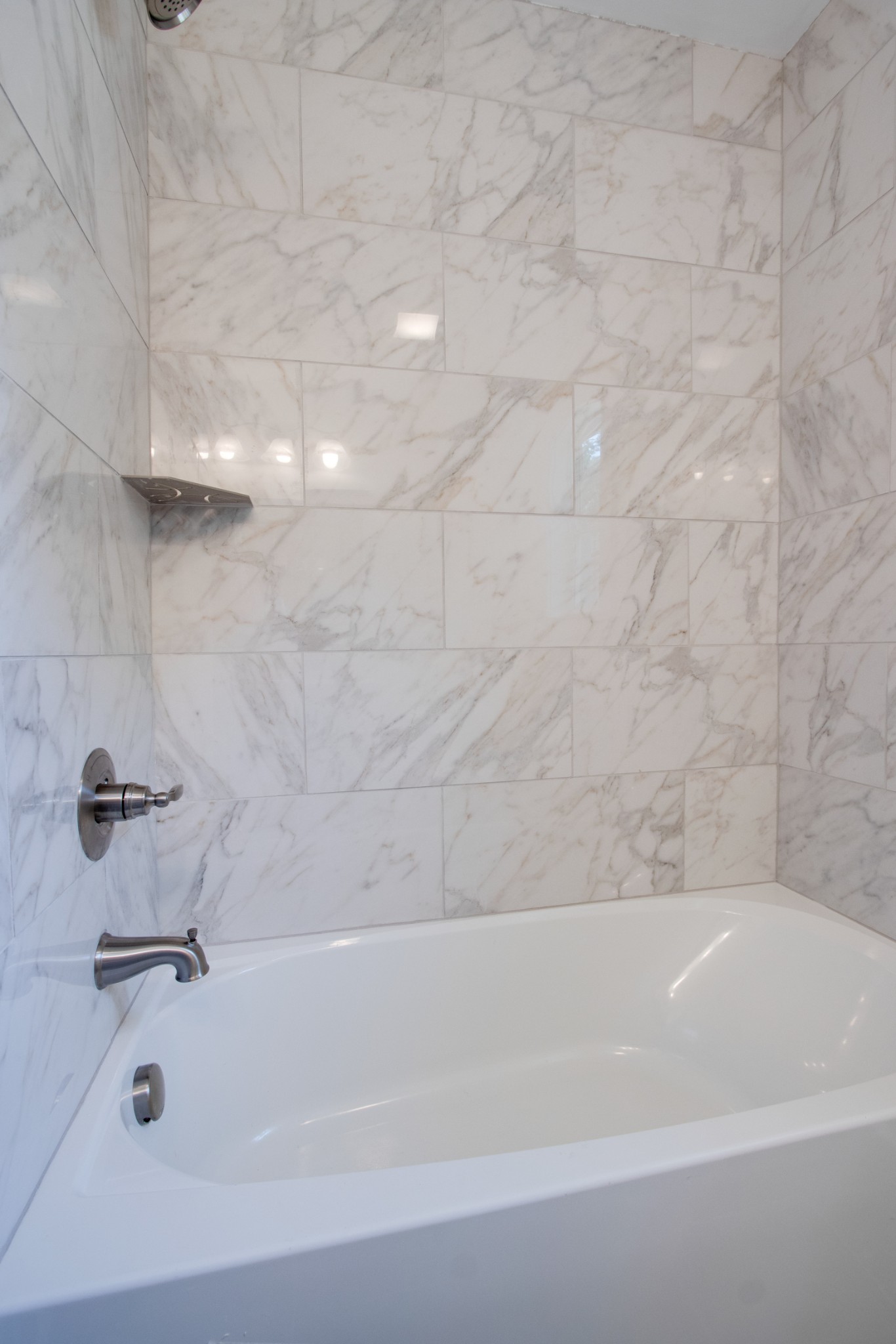 300 Randy Road Madison, TN 37115 - Photo 26 of 36 a bathroom with a bathtub