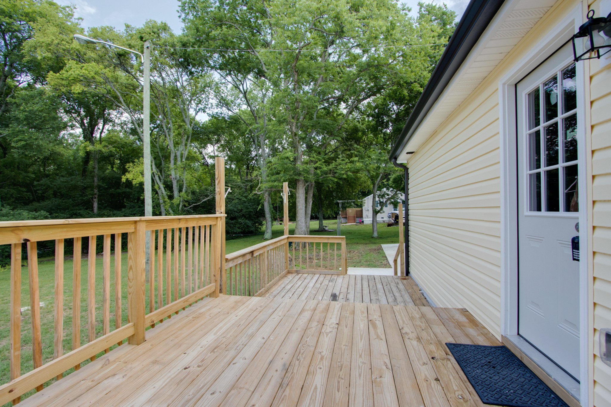 300 Randy Road Madison, TN 37115 - Photo 31 of 36 a view of balcony with wooden floor and outdoor seating