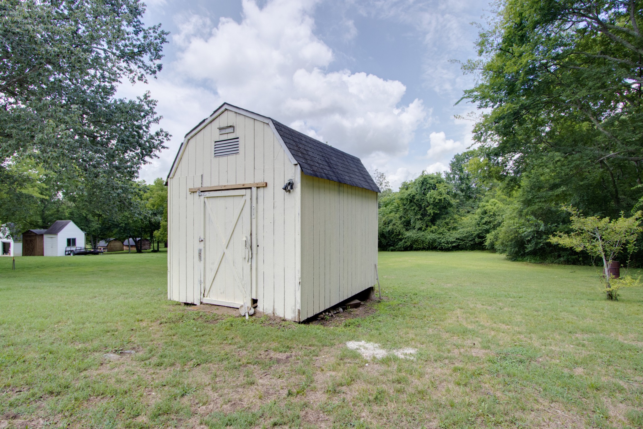 300 Randy Road Madison, TN 37115 - Photo 34 of 36 a view of a house with a yard