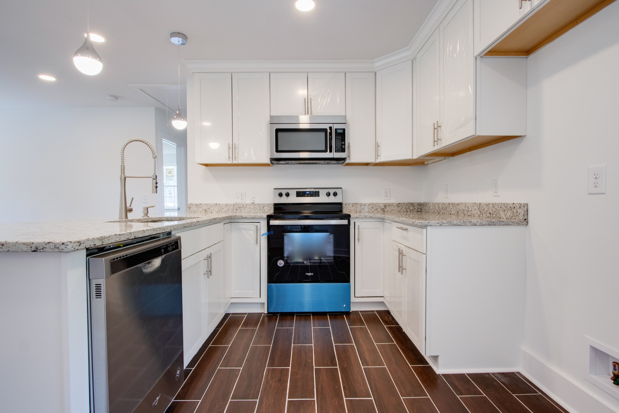 300 Randy Road Madison, TN 37115 - Photo 10 of 36 a kitchen with a sink and a stove top oven