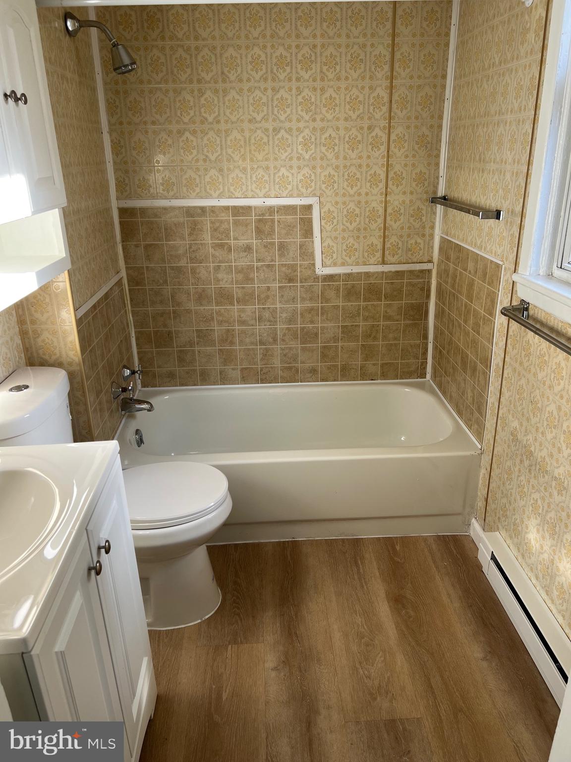 533 East Market Street Pottsville, PA 17901 - Photo 10 of 10 a bathroom with a toilet and a bath tub