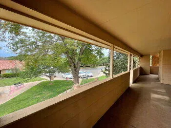 a view of a porch with a yard