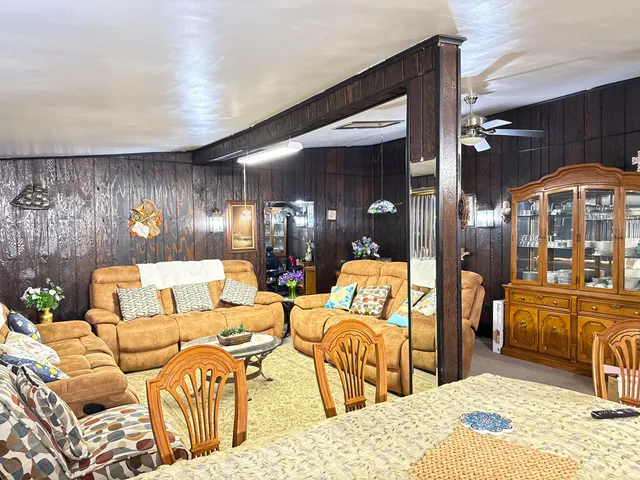 a outdoor living space with furniture and a fireplace