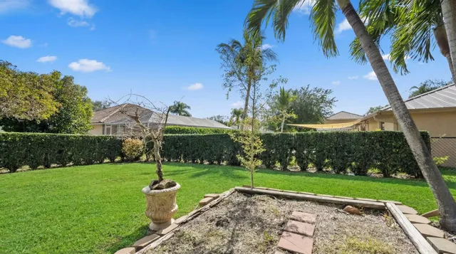 $615,000 | 115 Silver Bell Crescent, Royal Palm Beach, FL 33411