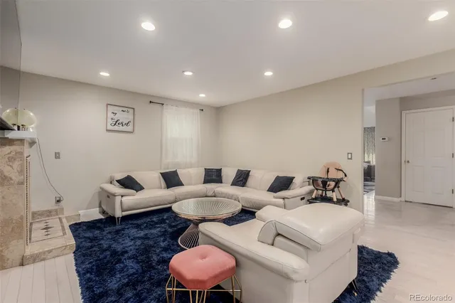 a living room with furniture and a couch