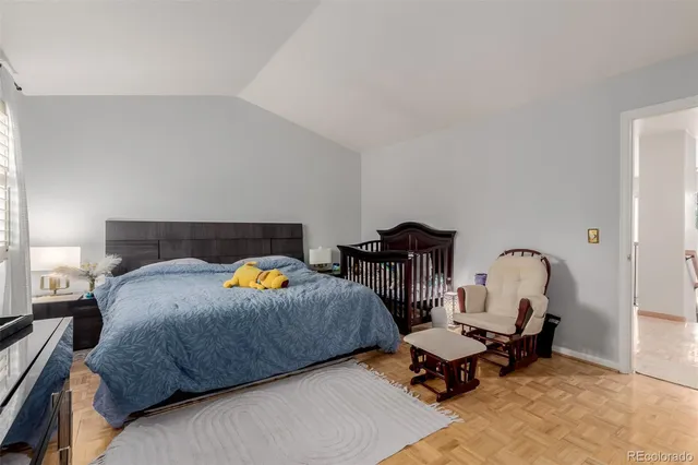 a bedroom with bed and a window