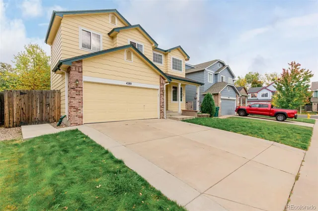 a front view of house with yard