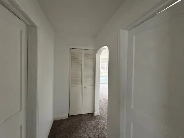 a view of a livingroom with wooden floor