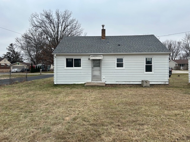 4715 50th Avenue Moline, IL 61265 - Photo 4 of 22 a front view of a house with a yard