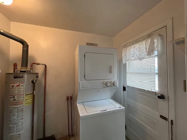 a bathroom with a sink a toilet and a shower