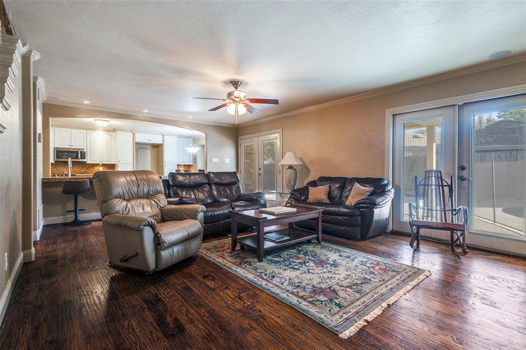 10 Biltmore Court Trophy Club, TX 76262 - Photo 13 of 25 a living room with furniture and a wooden floor