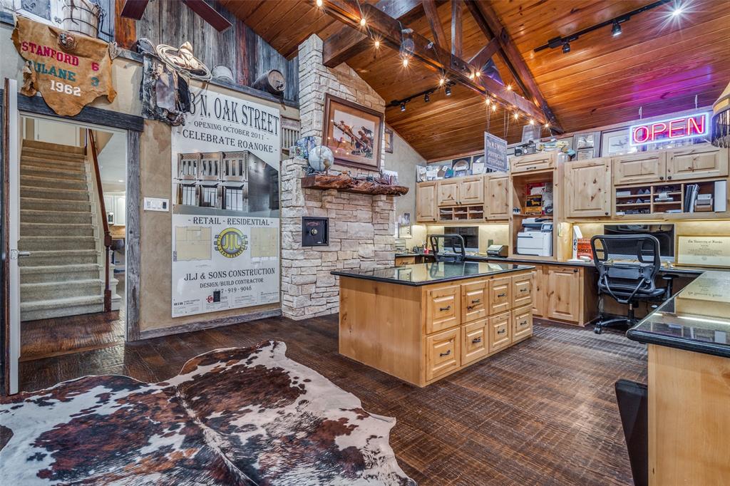 10 Biltmore Court Trophy Club, TX 76262 - Photo 15 of 25 a kitchen with stainless steel appliances granite countertop a stove a sink and a microwave