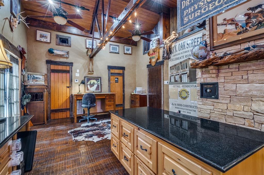 10 Biltmore Court Trophy Club, TX 76262 - Photo 16 of 25 a kitchen with stainless steel appliances granite countertop a stove a sink and a microwave