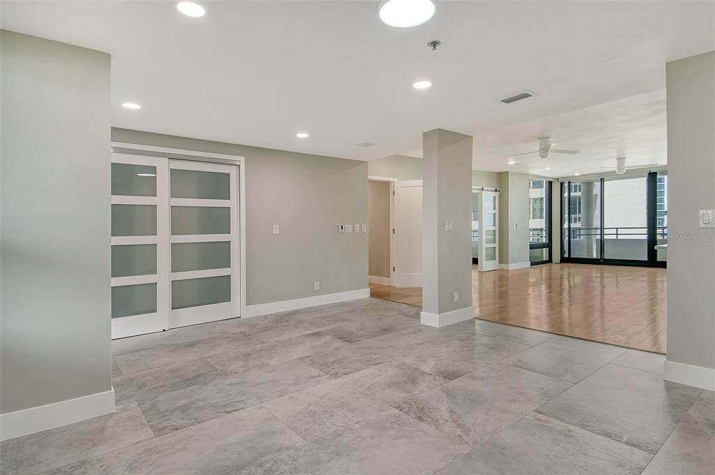 1255 North Gulfstream Avenue, Unit 702 Sarasota, FL 34236 - Photo 17 of 53 a view of an empty room with a window