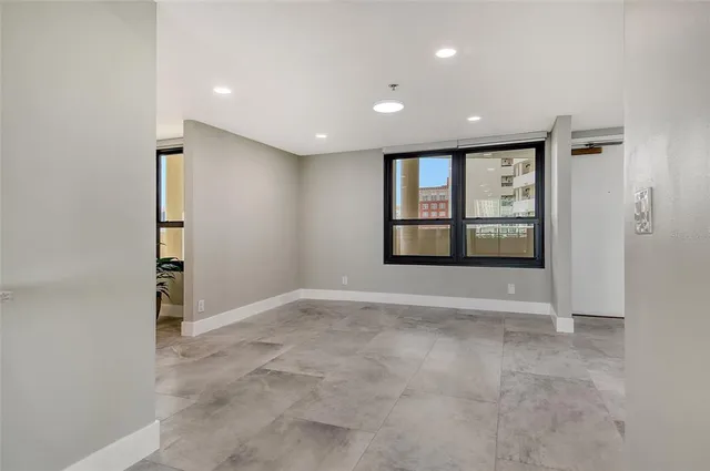 a view of an empty room with a window