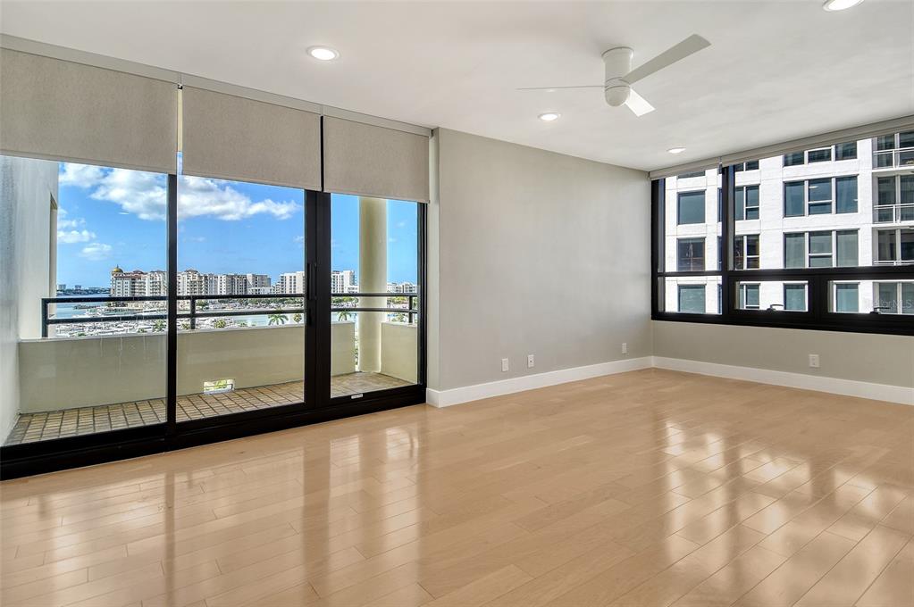 1255 North Gulfstream Avenue, Unit 702 Sarasota, FL 34236 - Photo 20 of 53 a view of an empty room with a window