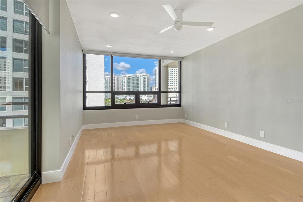 1255 North Gulfstream Avenue, Unit 702 Sarasota, FL 34236 - Photo 22 of 53 a view of an empty room with a window