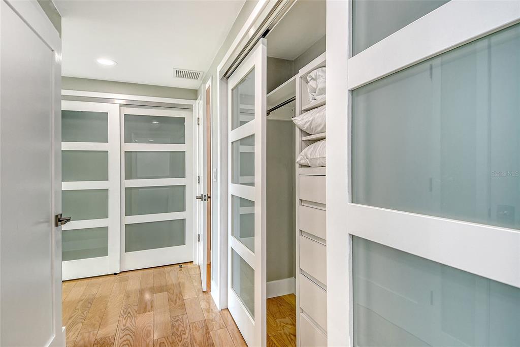1255 North Gulfstream Avenue, Unit 702 Sarasota, FL 34236 - Photo 30 of 53 a view of an empty walk in closet
