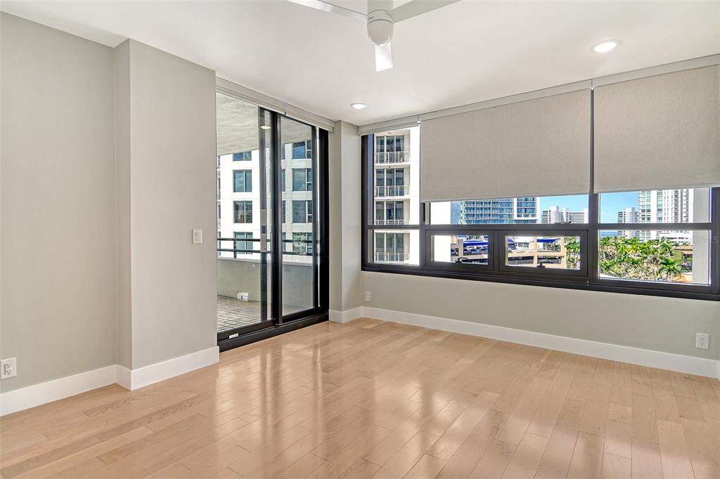 1255 North Gulfstream Avenue, Unit 702 Sarasota, FL 34236 - Photo 35 of 53 a view of an empty room with a window