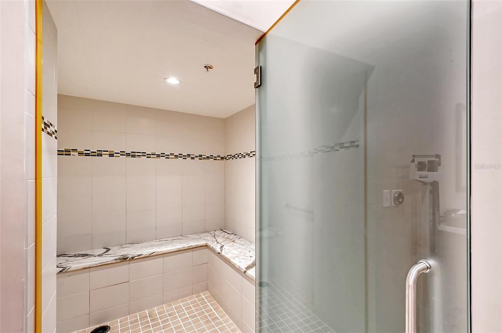 1255 North Gulfstream Avenue, Unit 702 Sarasota, FL 34236 - Photo 44 of 53 a bathroom with a shower