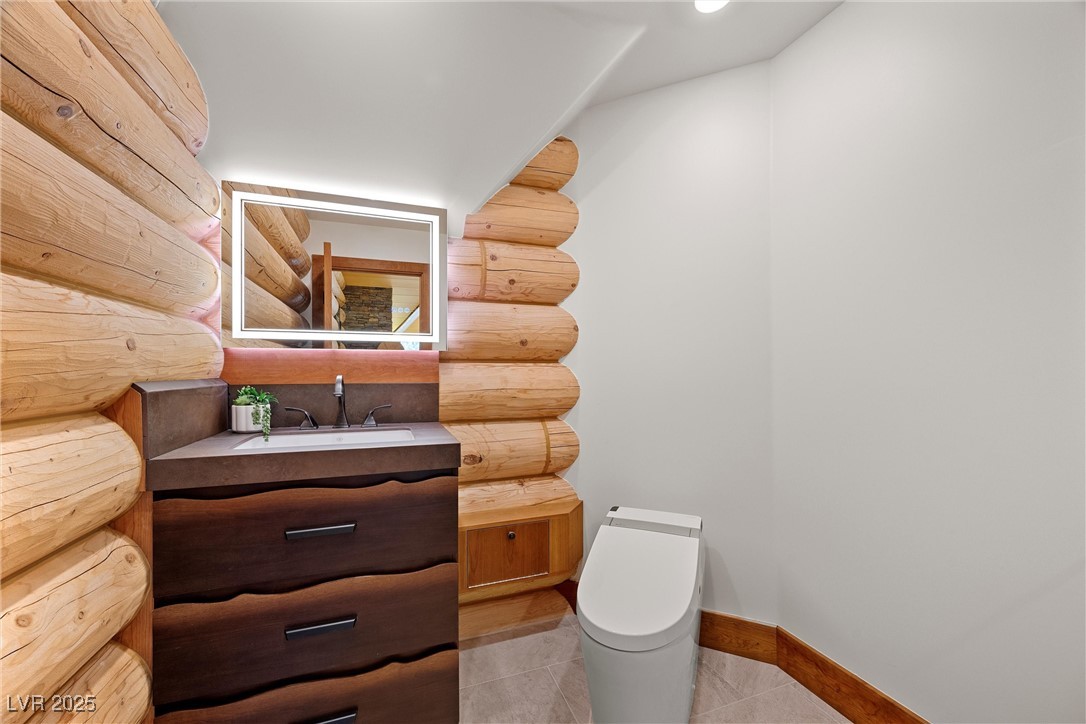4927 Snow White Road Mount Charleston, NV 89124 - Photo 32 of 65 Bathroom featuring, light up mirror, porcelain countertops, light up self-closing drawers