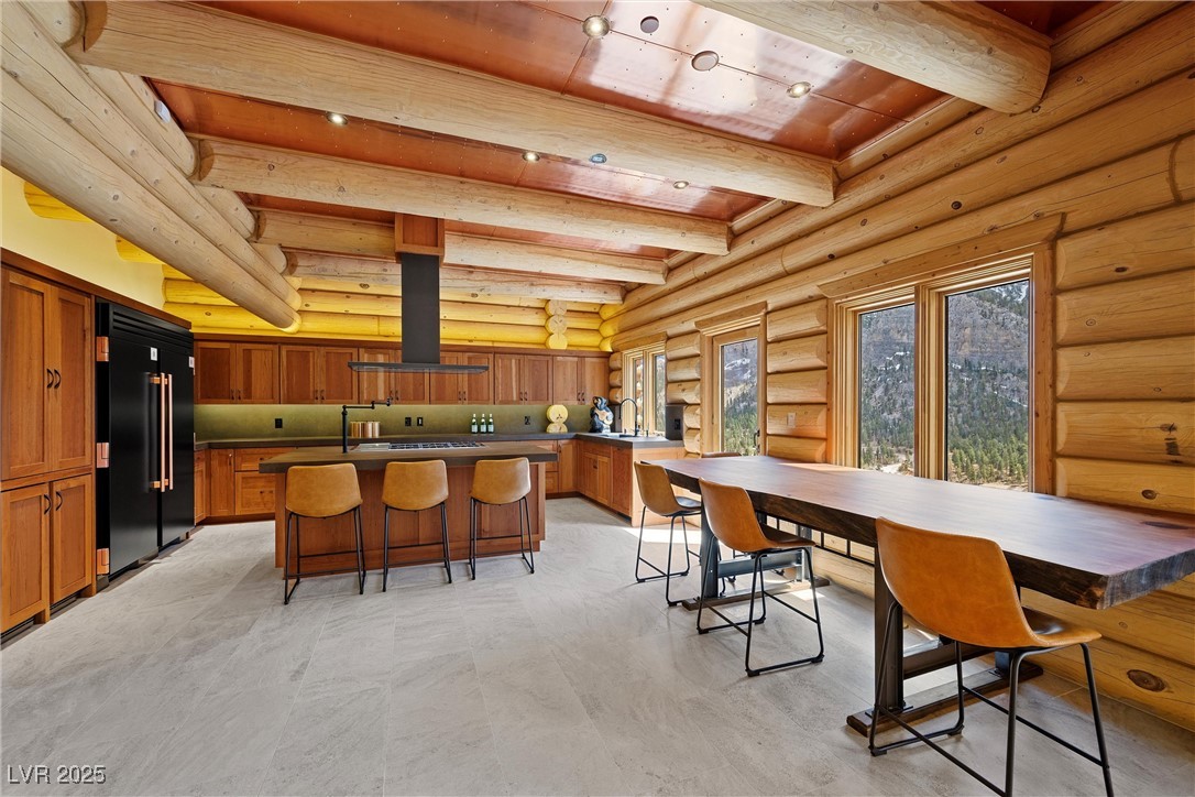 4927 Snow White Road Mount Charleston, NV 89124 - Photo 8 of 65 Dining area featuring copper ceiling, Sequoia wood dining table