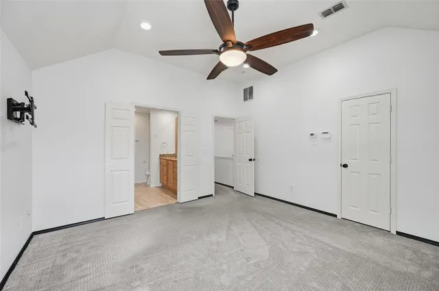 a view of an empty room and window