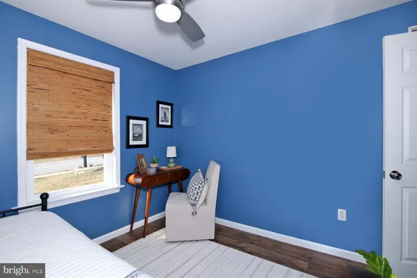 a living room with furniture and window