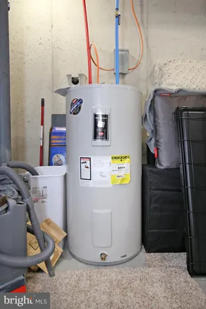 a room with lots of storage and a utility