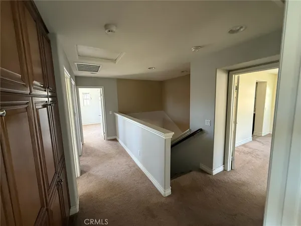 a view of an empty room and a gallery