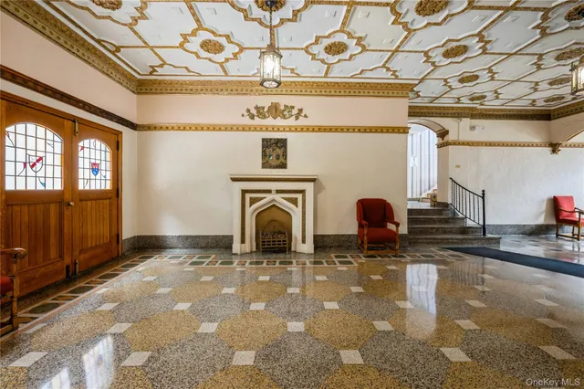 a view of a water heater room with a fireplace