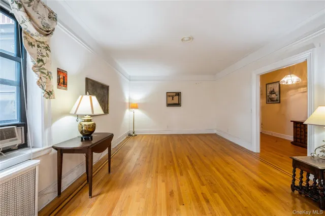 a view of a livingroom with furniture and wooden floor