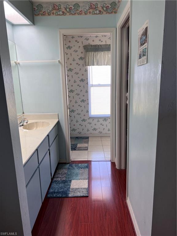 140 Bordeaux Circle Naples, FL 34112 - Photo 11 of 22 a bathroom with a sink and a bathtub