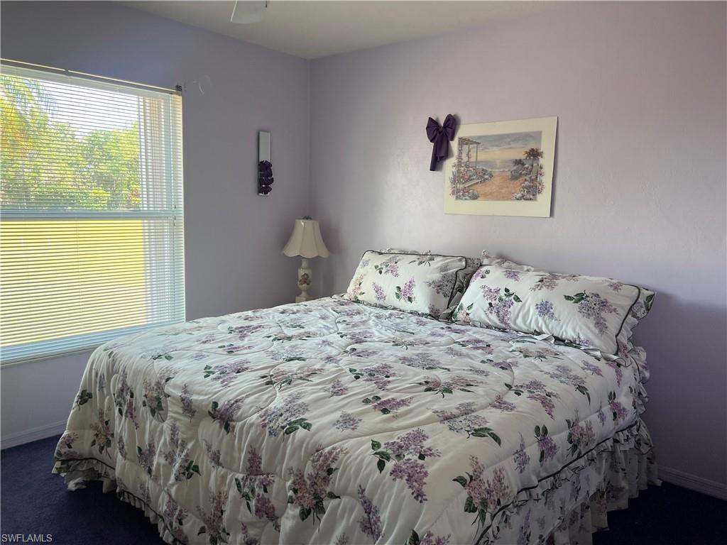 140 Bordeaux Circle Naples, FL 34112 - Photo 15 of 22 a bedroom with a bed and a window