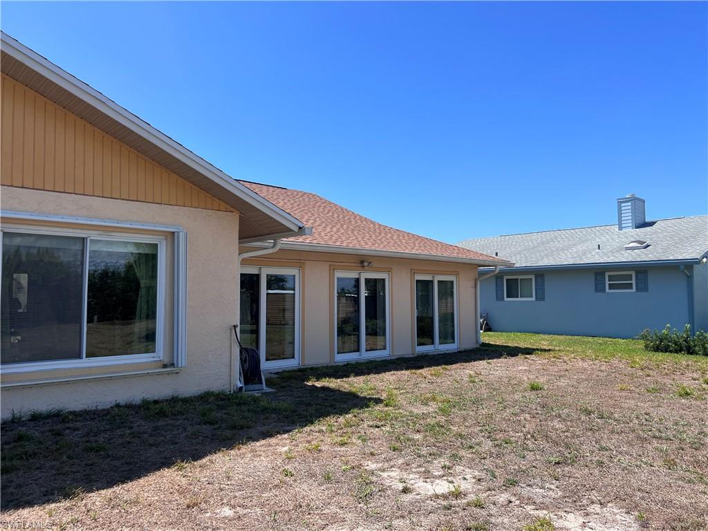 140 Bordeaux Circle Naples, FL 34112 - Photo 6 of 22 a view of a house with a yard