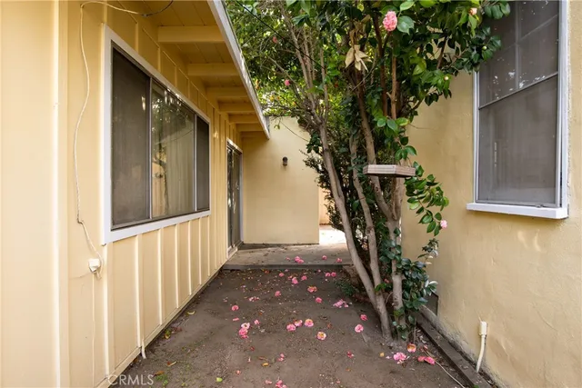 a view of a house with wooden stairs