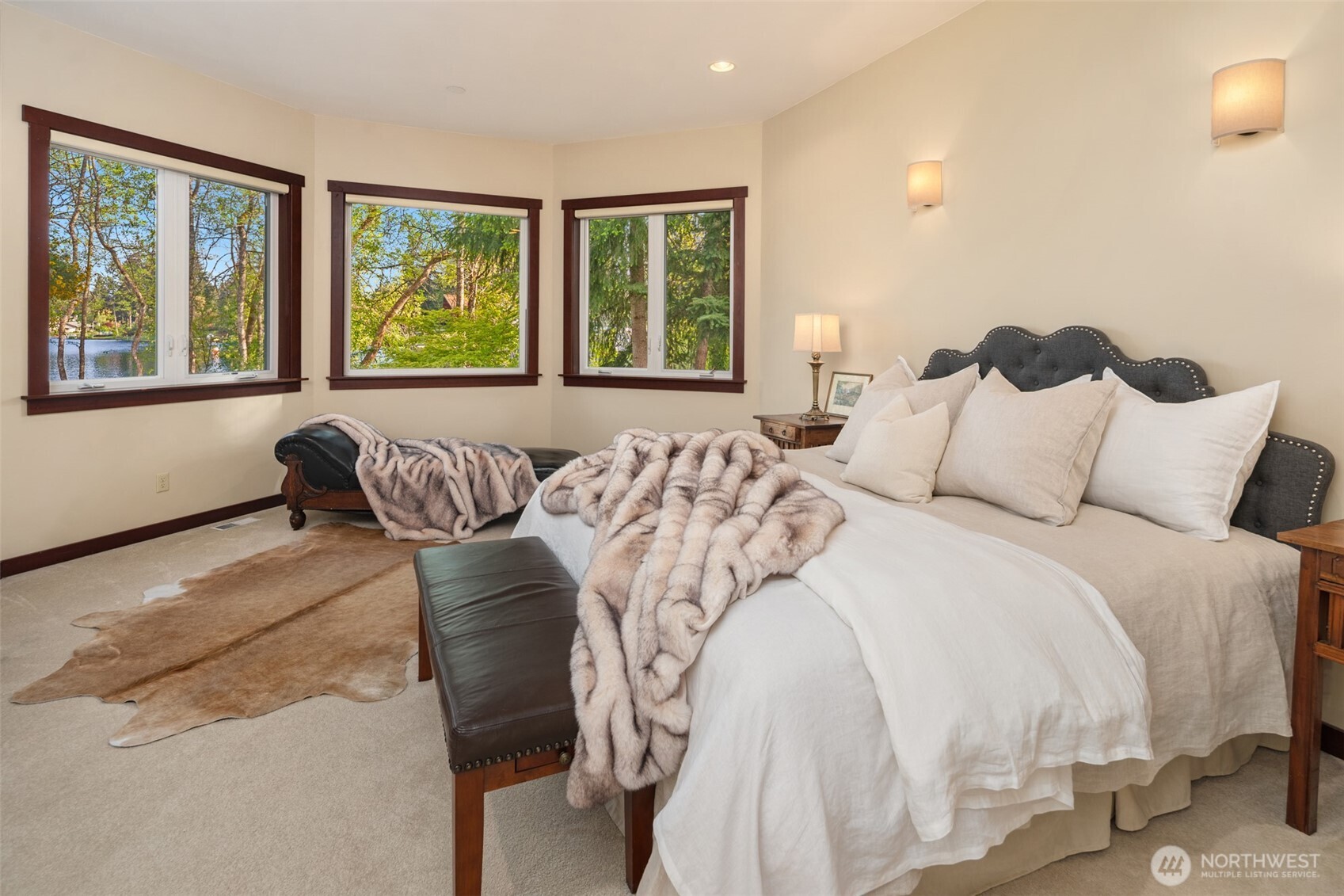 1000 Creso Road South Spanaway, WA 98387 - Photo 14 of 40 a bedroom with a bed and a large window