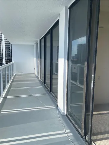 a view of entryway with a front door