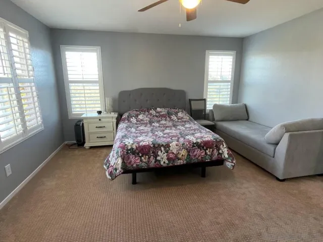 a bathroom with a mirror and a sink