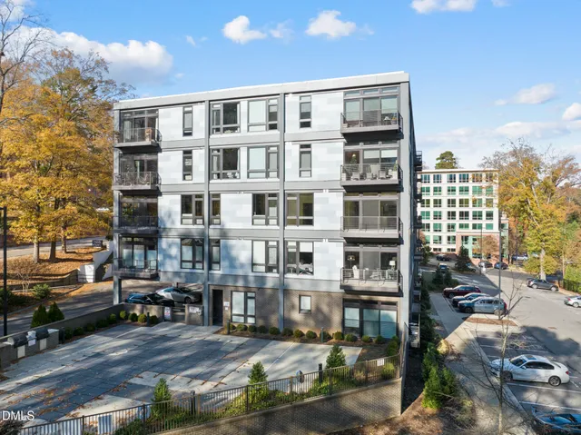 a front view of a building with street view