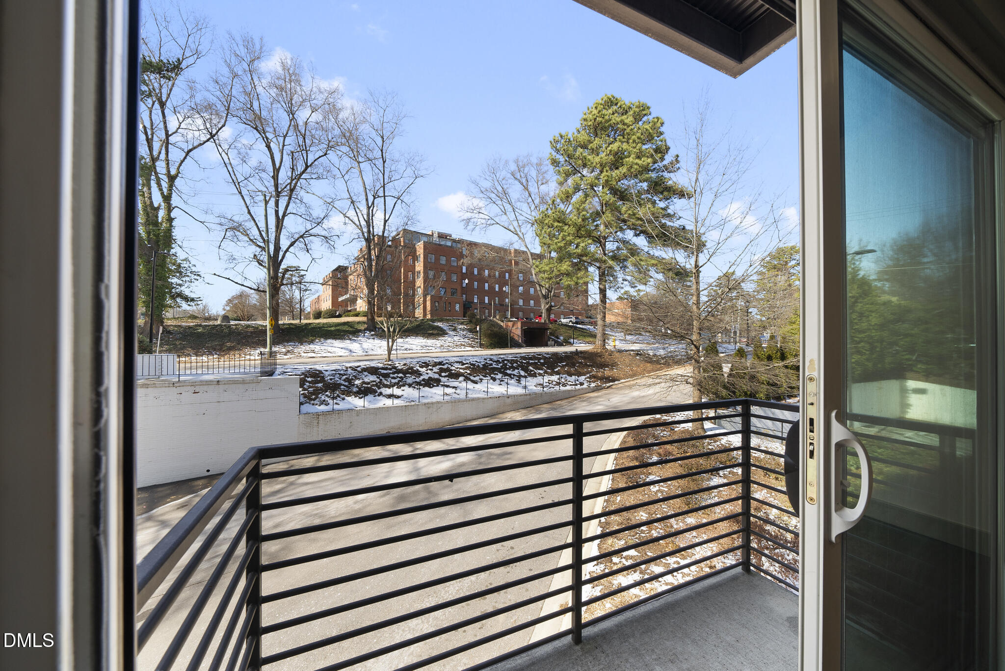 1300 St Marys Street, Unit 207 Raleigh, NC 27605 - Photo 17 of 18 a view of a balcony with an outdoor space