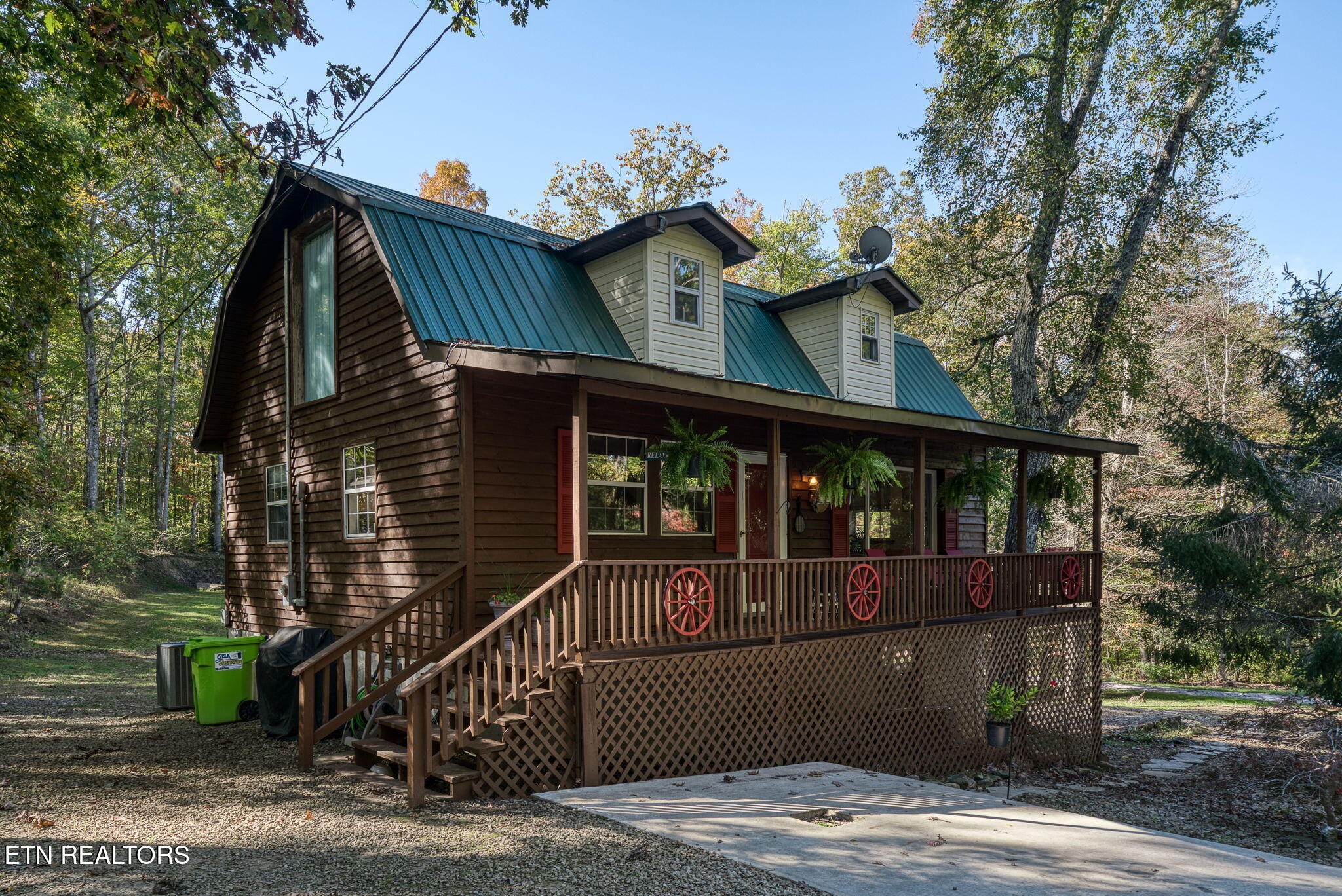 279 Siever Road Crossville, TN 38572 - Photo 2 of 35 a view of a house with a iron gate