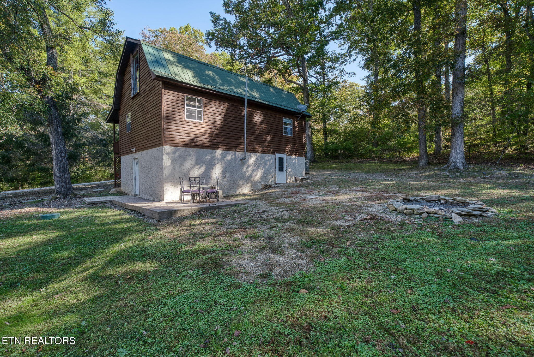 279 Siever Road Crossville, TN 38572 - Photo 32 of 35 a view of outdoor space yard and tree